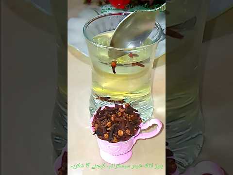 Glass of clove water detox drink used for weight loss, fat burning, and cholesterol control