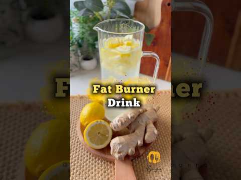 Glass of lemon ginger detox water for fat burning and weight loss