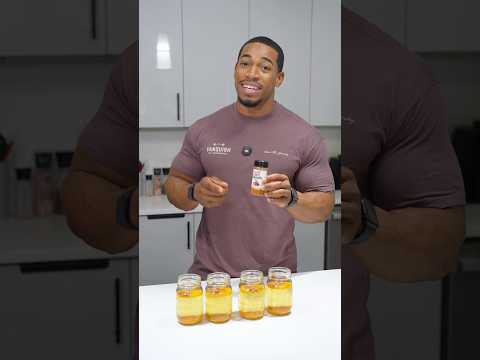 Glass of natural homemade fat burner drink made with lemon, ginger, and spices