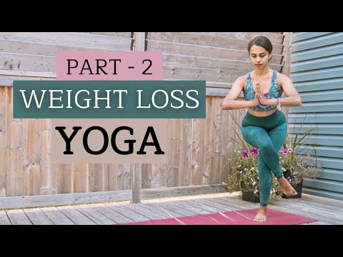 Woman performing yoga pose at home for weight loss and fat burning