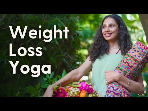 Woman performing yoga poses in living room for total body workout and weight loss