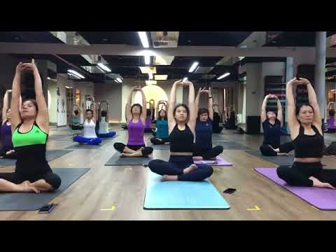 Instructor demonstrating full weight loss yoga workout for fast fat loss
